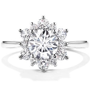Hearts On Fire’s Delight Lady Di engagement ring features a blooming halo and perfectly cut center and accenting diamonds