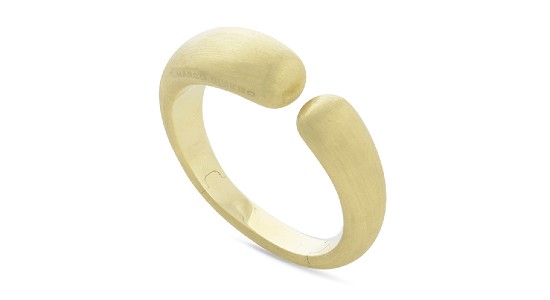a bold, yellow gold statement cuff bracelet by Marco Bicego