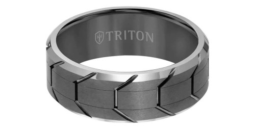 A bold men’s wedding band from Triton with a distinctive tire track pattern, available at Rogers Jewelry Co.