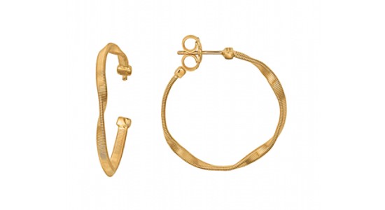 a pair of yellow gold hoop earrings with twisted metal