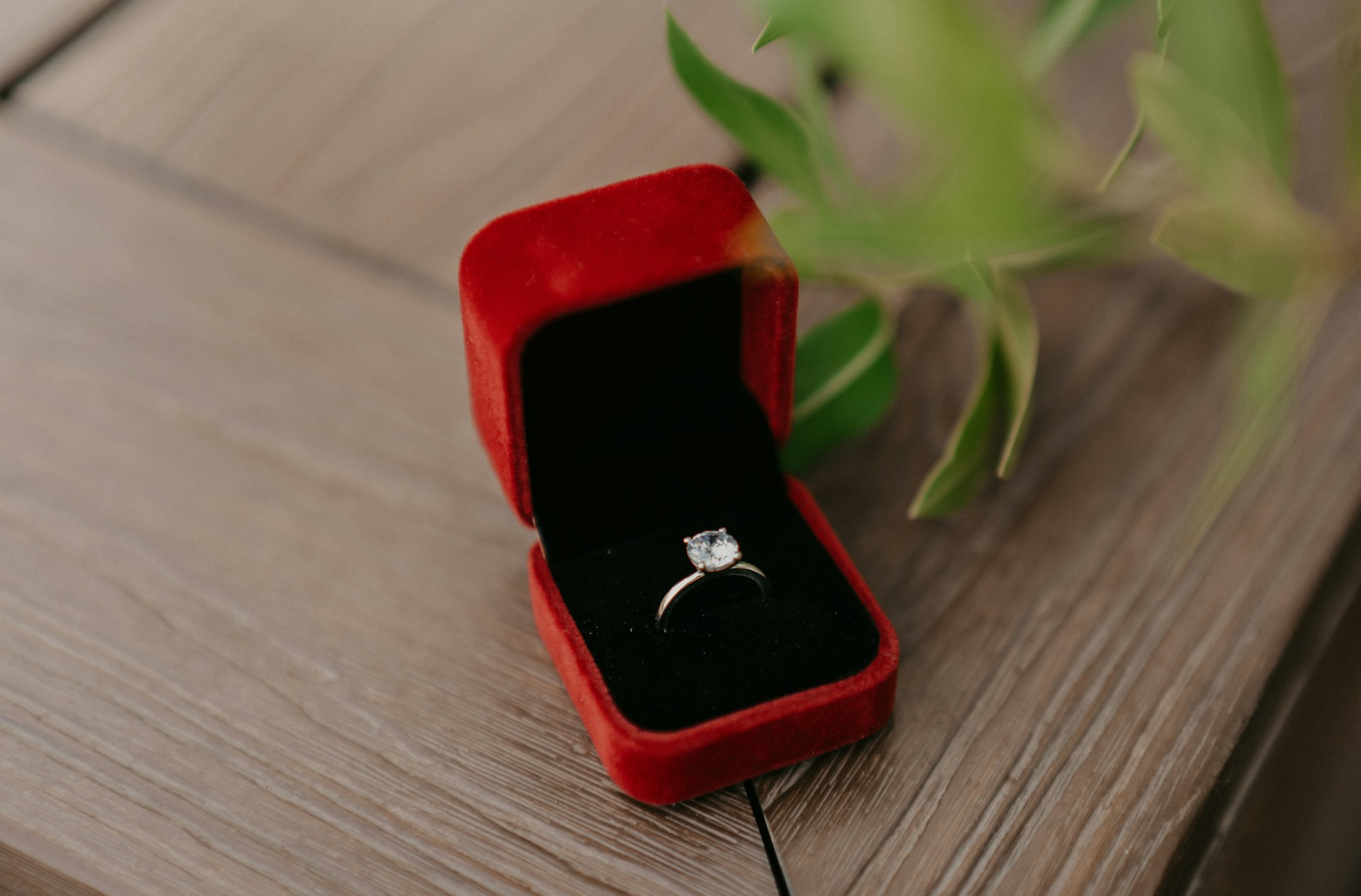 a diamond engagement ring in a jewelry box