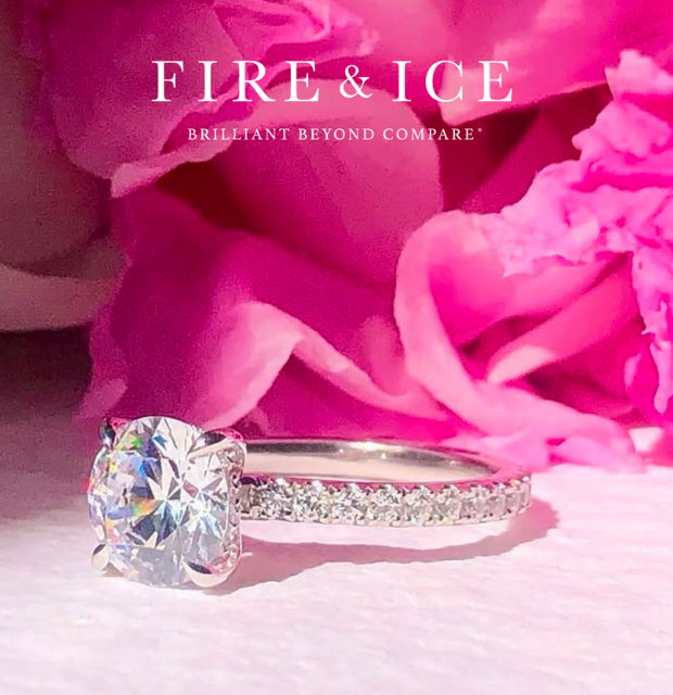 Fire & Ice Valentine's Day image featuring an engagement ring in front of pink flower petals